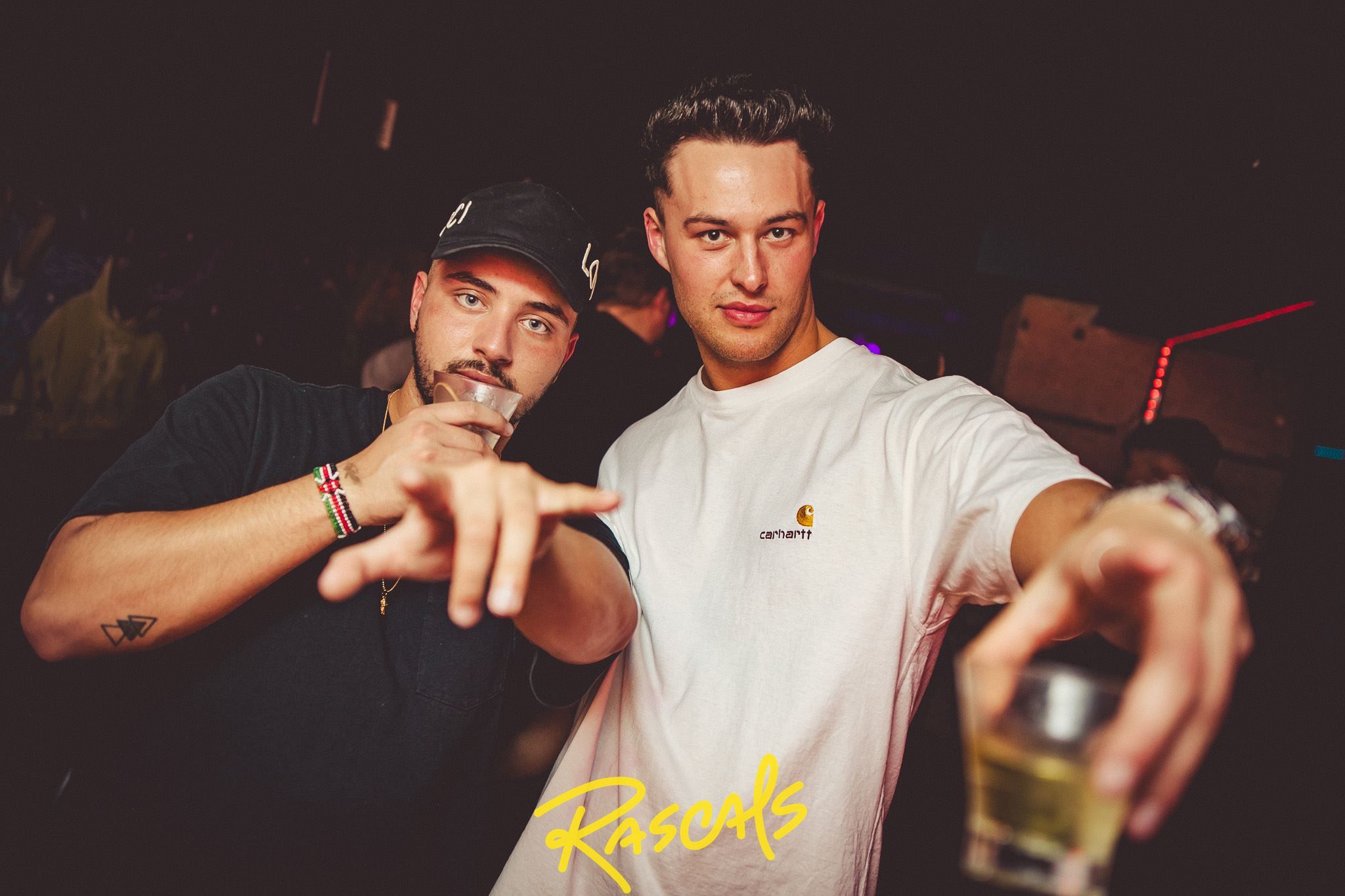 Image may contain: Finger, Club, Night Club, Human, Person