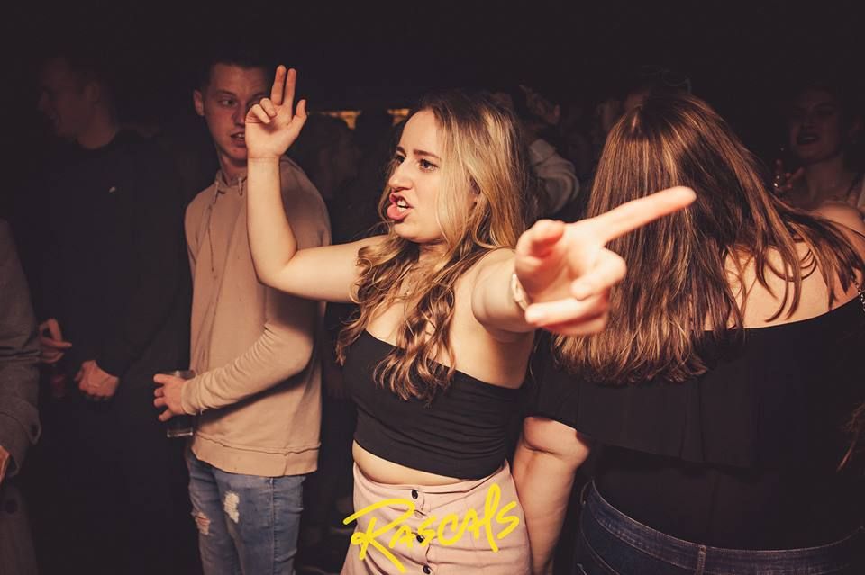Image may contain: Leisure Activities, Clothing, Apparel, Night Life, Night Club, Club, Party, Human, Person