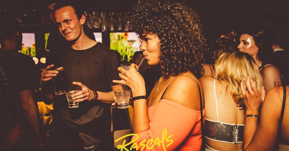 Image may contain: Night Club, Club, Night Life, Afro Hairstyle, Party, Hair, Human, Person