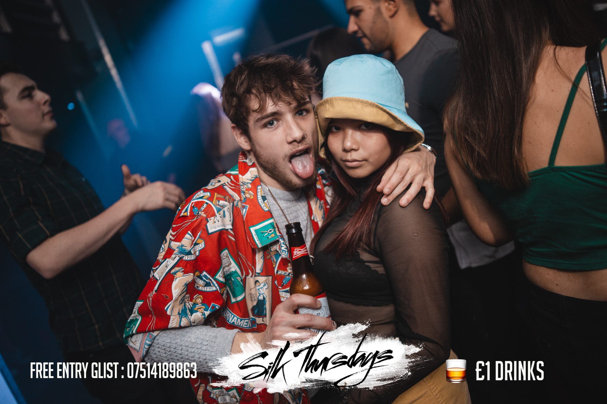 Image may contain: Night Life, Party, Night Club, Club, Apparel, Hat, Clothing, Person, Human