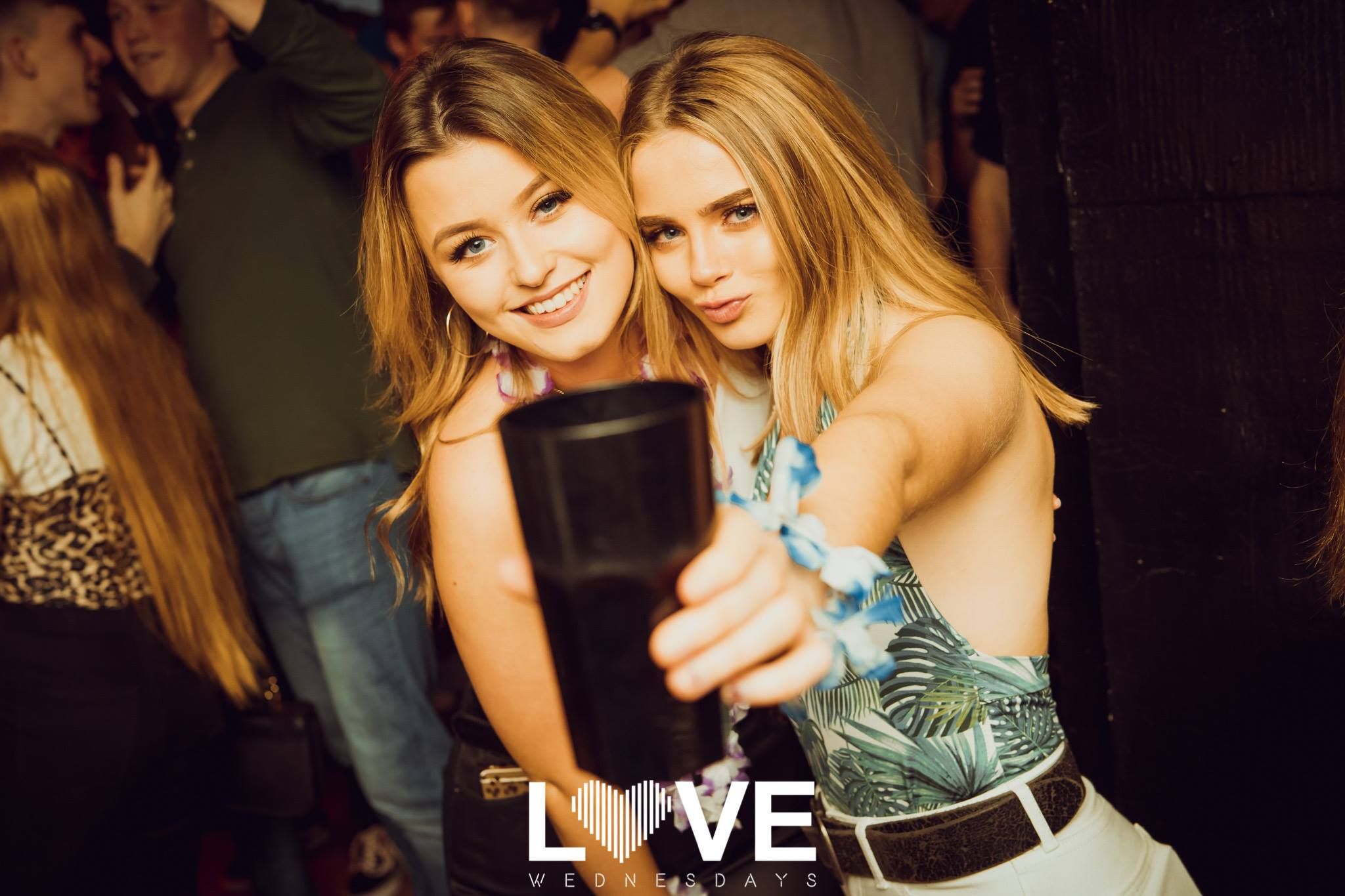Image may contain: Party, Drink, Beverage, Alcohol, Beer, Night Club, Night Life, Club, Person, Human