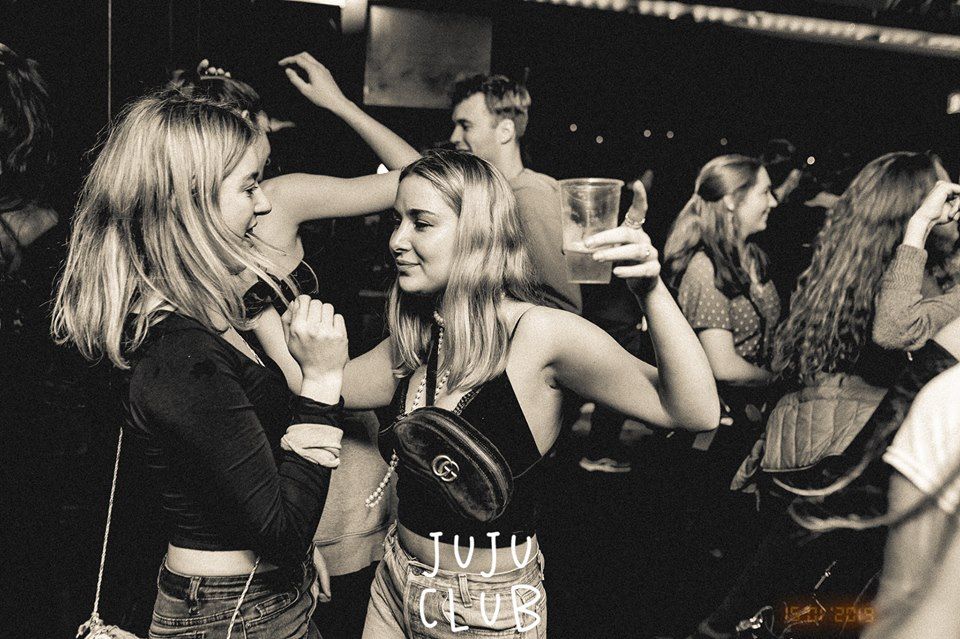 Image may contain: Bar Counter, Pub, Night Life, Night Club, Club, Party, Human, Person