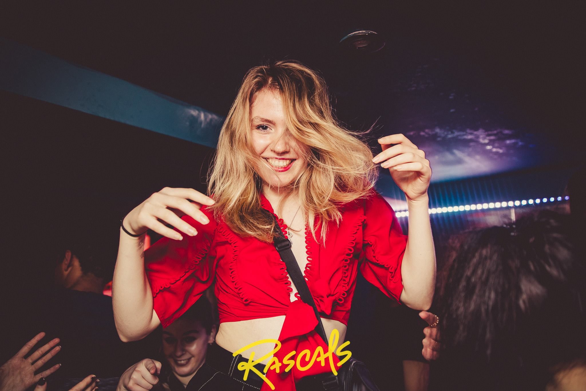 Image may contain: Apparel, Clothing, Night Club, Club, Night Life, Person, Human