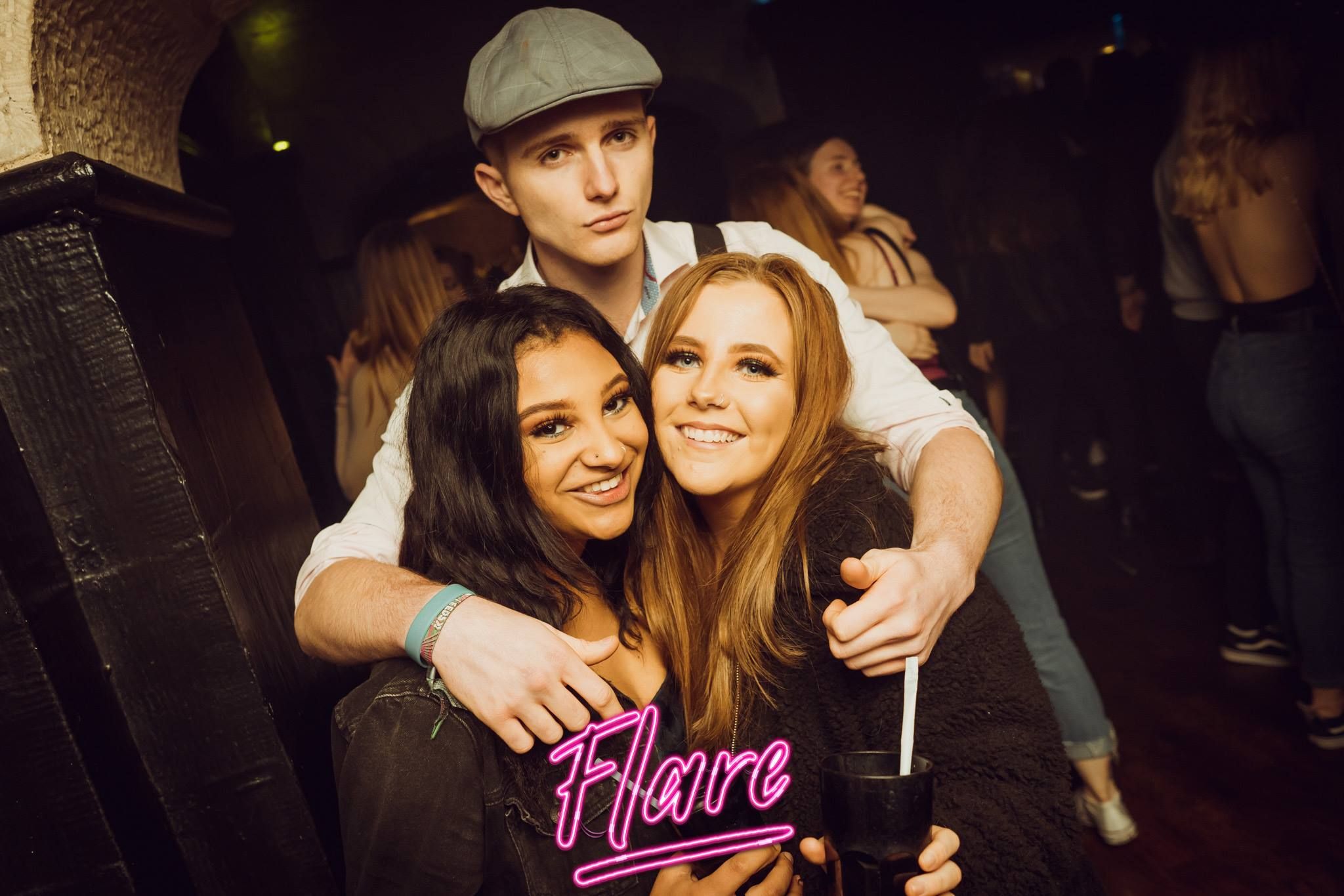 Image may contain: Bar Counter, Night Life, Pub, Hat, Clothing, Apparel, Party, Night Club, Club, Human, Person