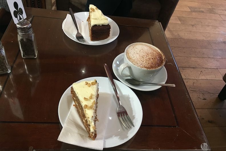 Image may contain: Chocolate, Beverage, Hot Chocolate, Drink, Coffee Cup, Cream, Icing, Creme, Table, Sweets, Confectionery, Cup, Furniture, Dish, Meal, Saucer, Pottery, Cake, Fork, Cutlery, Food, Dessert