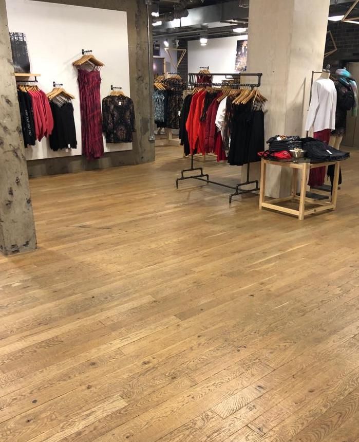 Image may contain: Clothing, Apparel, Wood, Boutique, Shop, Human, Person, Flooring, Floor