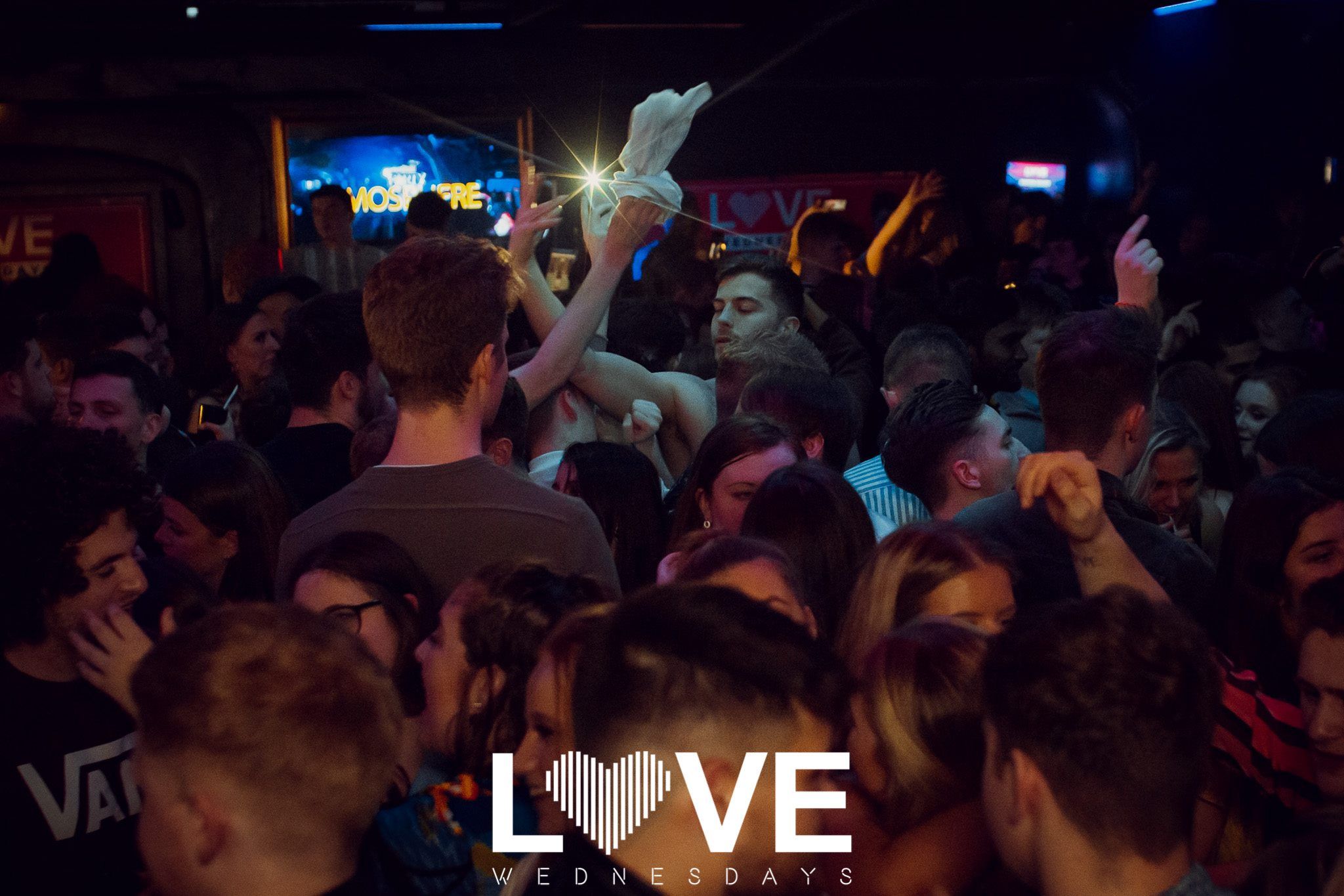 Image may contain: Disco, Bar Counter, Pub, Audience, Crowd, Party, Night Life, Night Club, Club, Person, Human