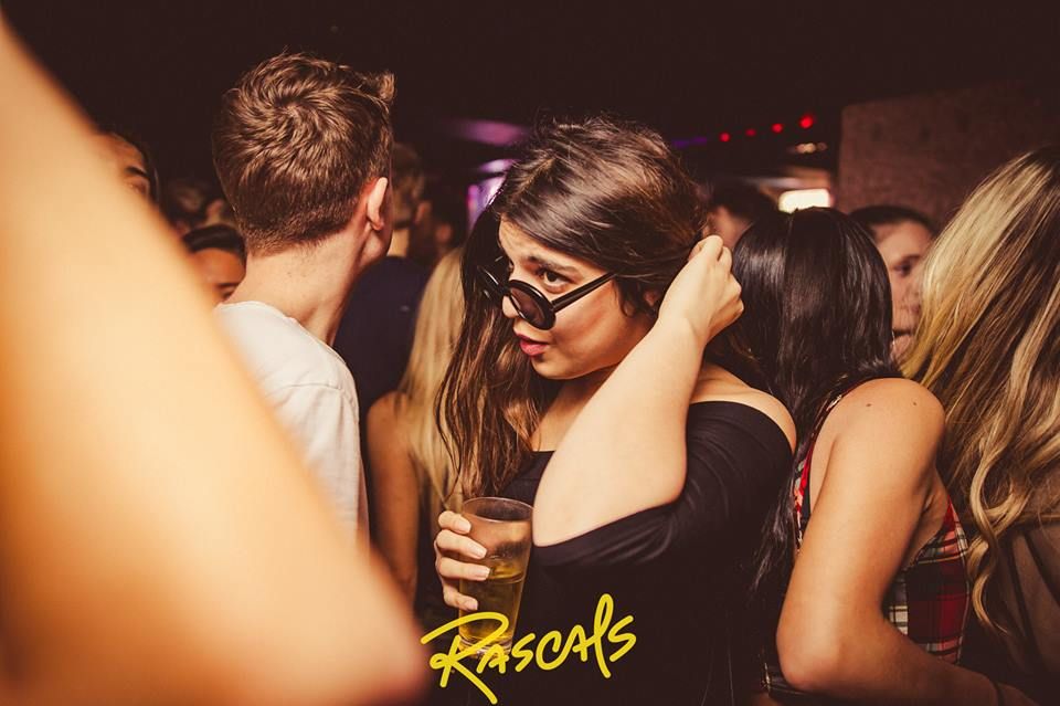 Image may contain: Drink, Beverage, Night Club, Night Life, Club, Party, Human, Person