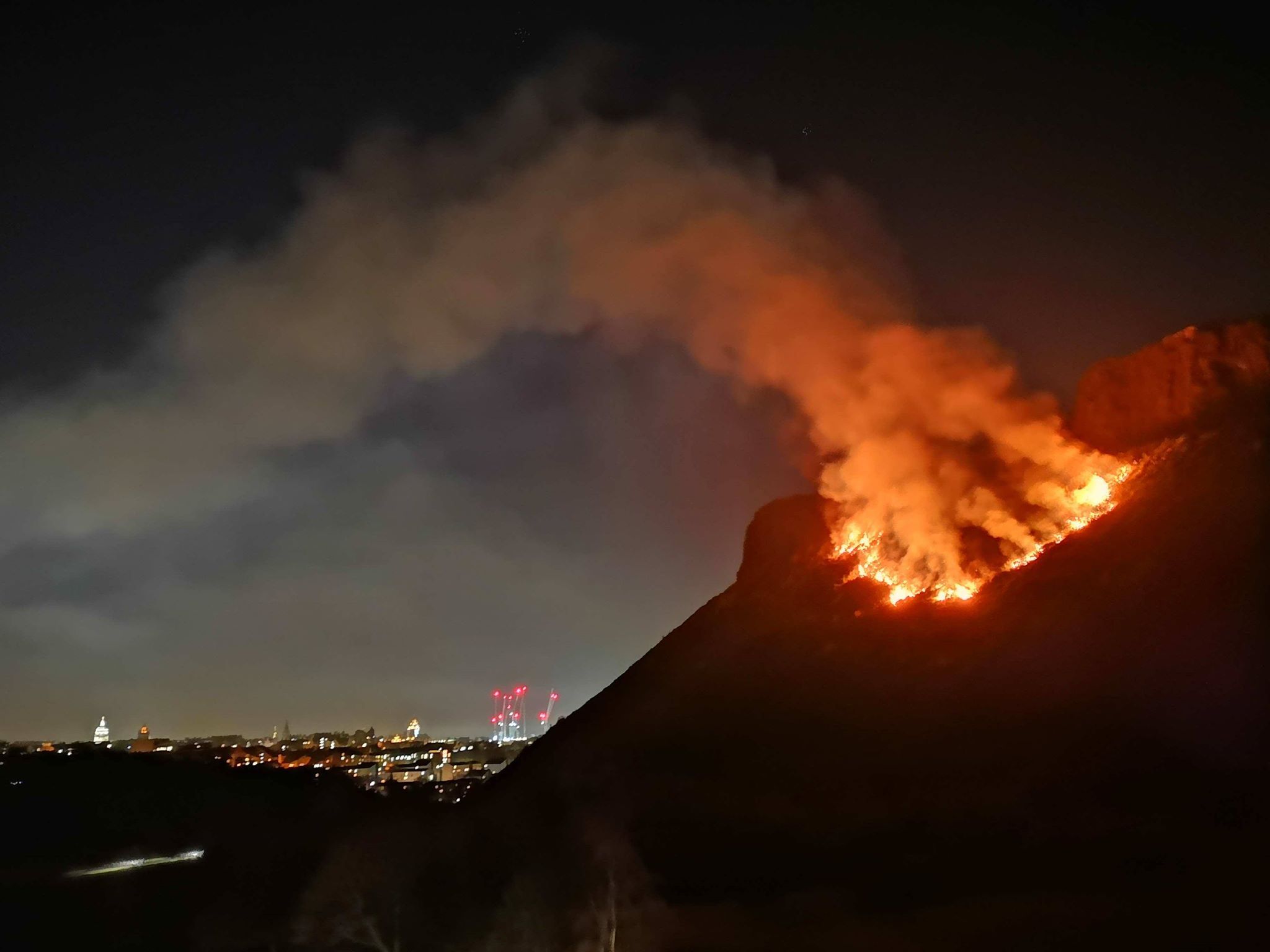 Image may contain: Flame, Fire, Bonfire, Eruption, Volcano, Mountain, Outdoors, Nature