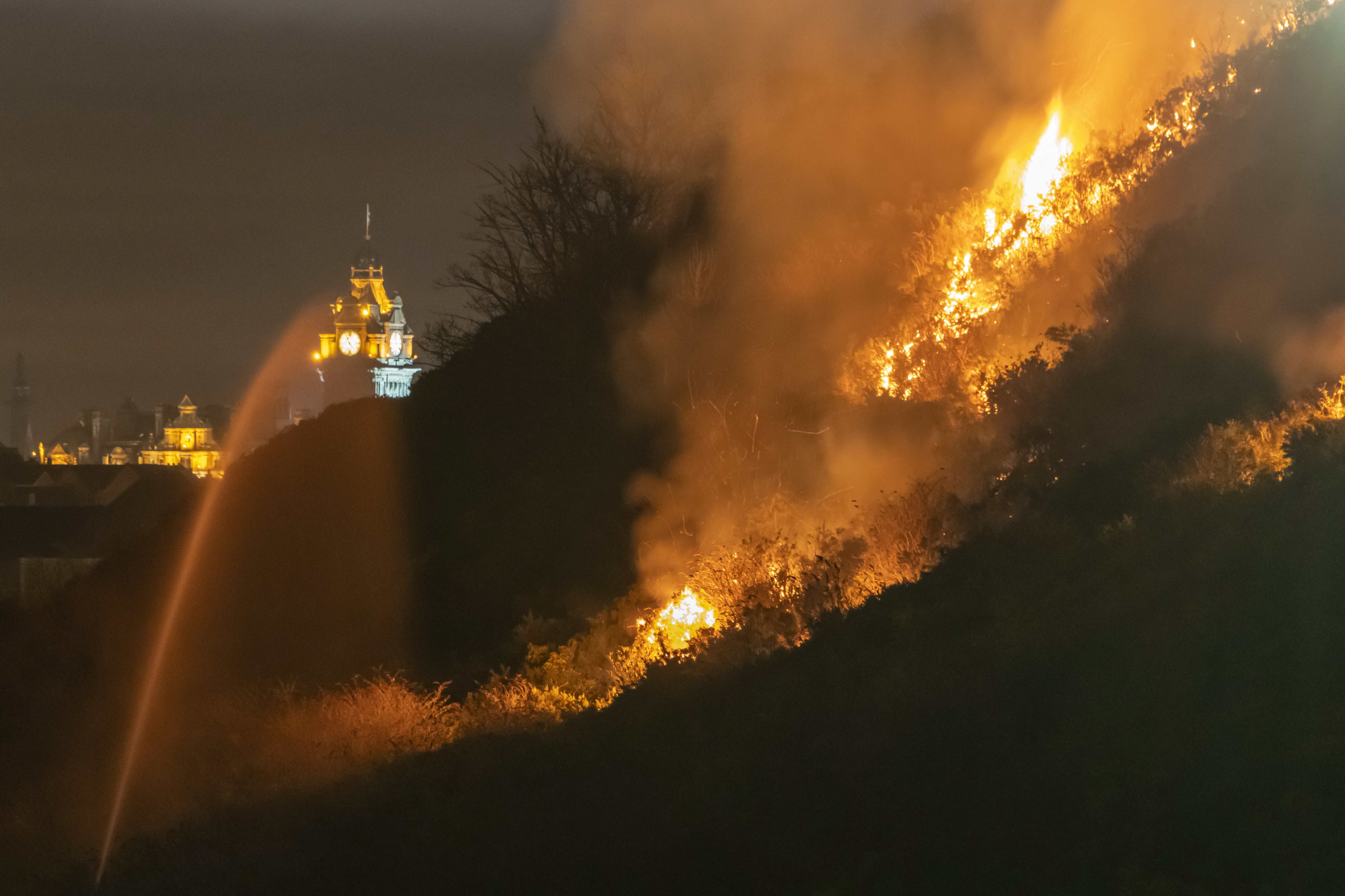 Image may contain: Forest Fire, Light, Flare, Flame, Bonfire, Fire