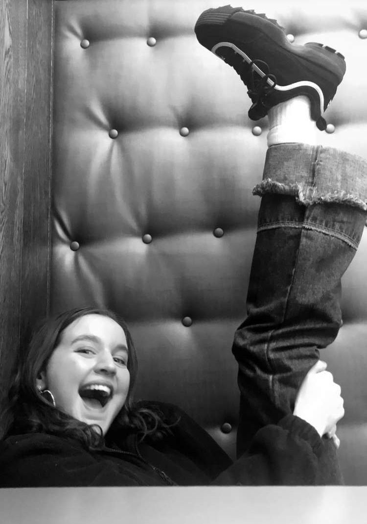 Image may contain: Laughing, Photo, Portrait, Photography, Blonde, Teen, Girl, Woman, Child, Kid, Female, Smile, Apparel, Clothing, Chair, Furniture, Person, Face, Human