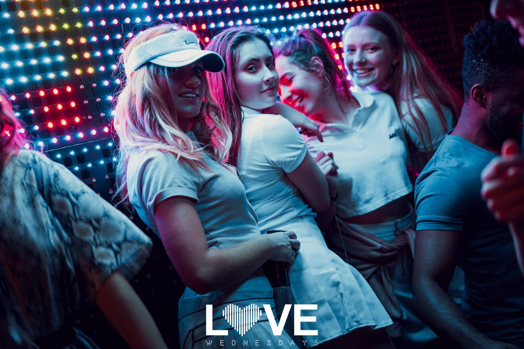 Image may contain: Party, Night Club, Club, Clothing, Hat, Apparel, Person, Human