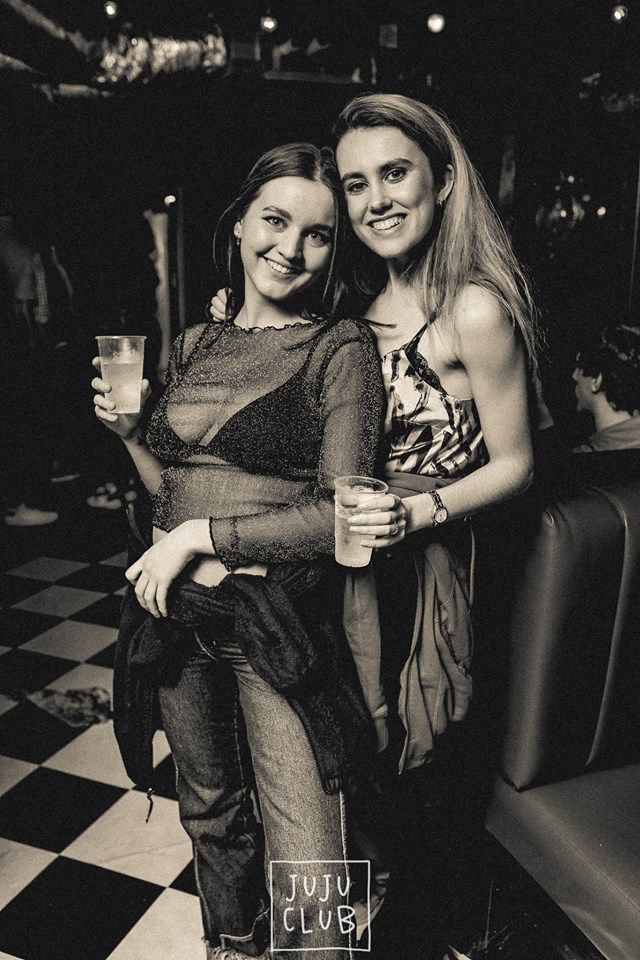 Image may contain: Alcohol, Beverage, Drink, Night Life, Bar Counter, Pub, Night Club, Club, Person, Human