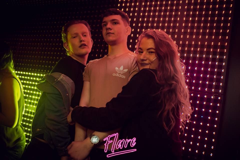 Image may contain: Apparel, Clothing, Leisure Activities, Karaoke, Night Club, Club, Indoors, Interior Design, Person, Human
