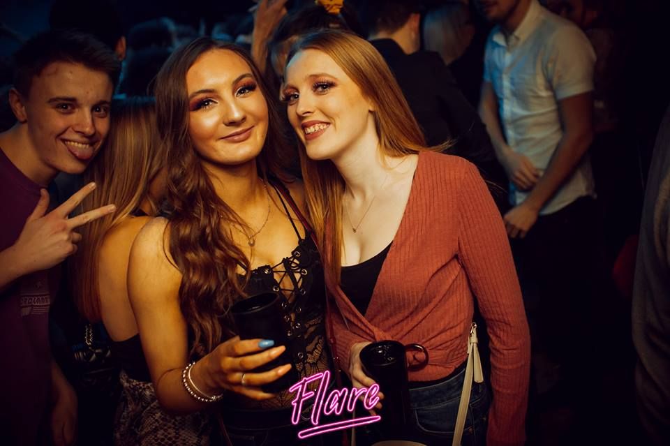 Image may contain: Bar Counter, Pub, Night Life, Party, Night Club, Club, Human, Person
