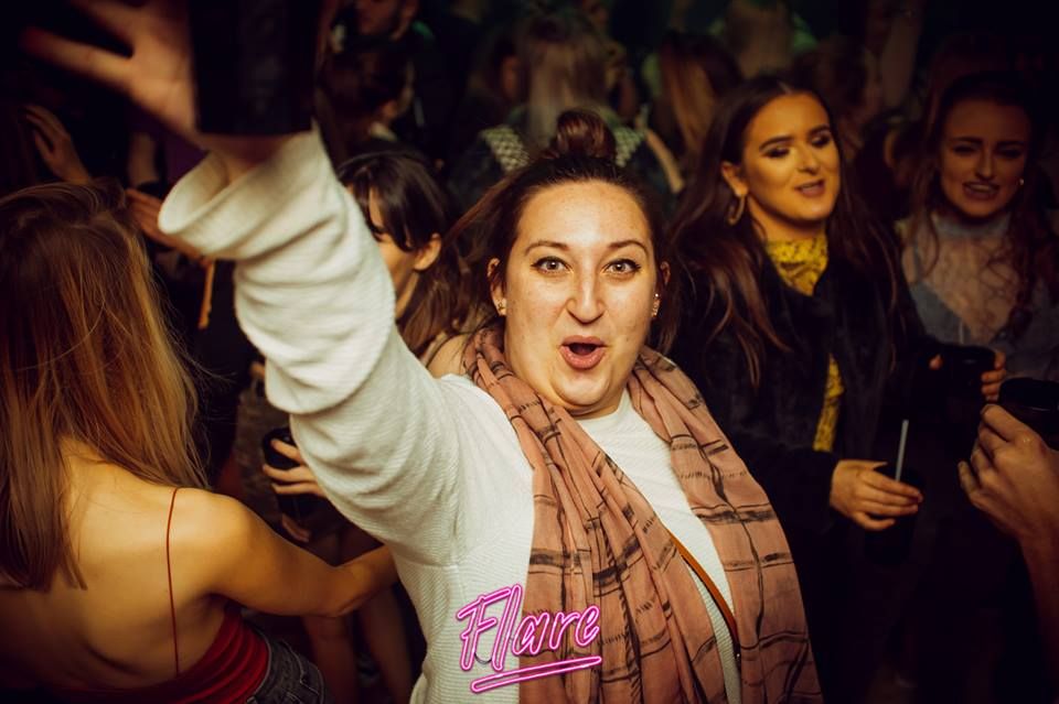 Image may contain: Face, Party, Night Club, Club, Audience, Crowd, Night Life, Person, Human