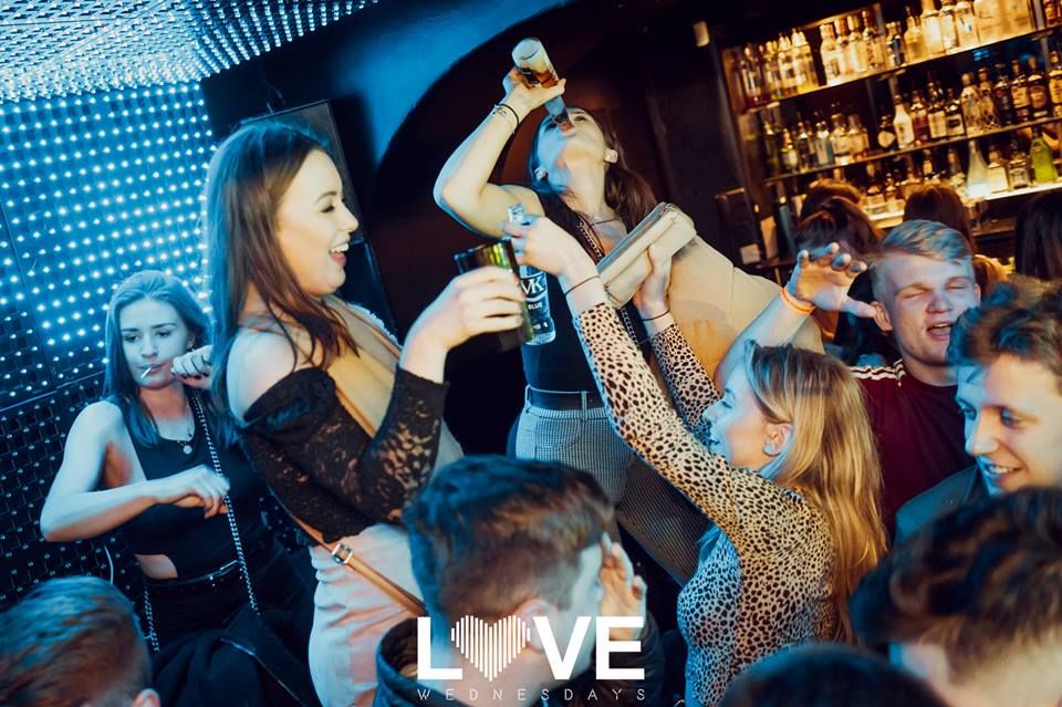 Image may contain: Leisure Activities, Bar Counter, Pub, Party, Night Life, Night Club, Club, Human, Person