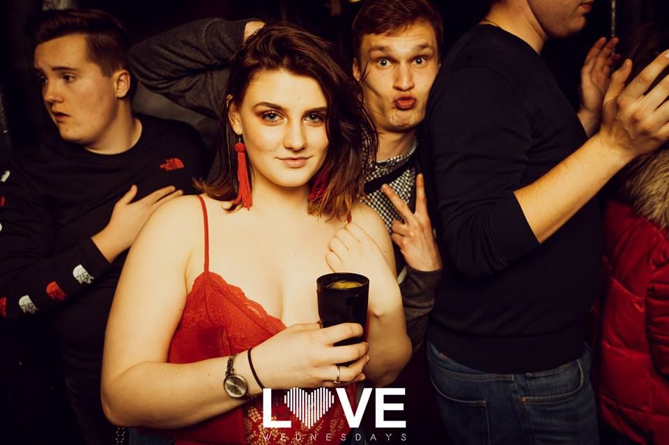 Image may contain: Night Club, Alcohol, Drink, Beverage, Club, Night Life, Party, Person, Human