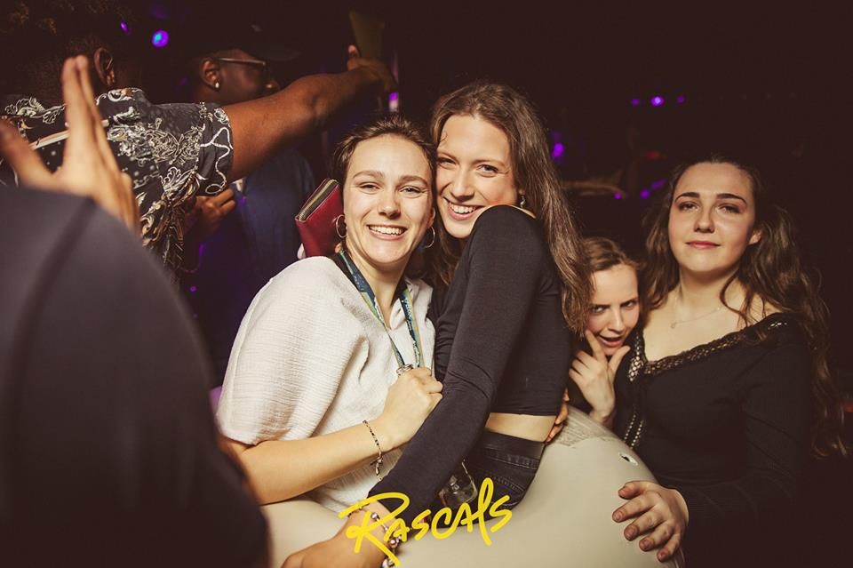 Image may contain: People, Night Life, Night Club, Club, Party, Person, Human