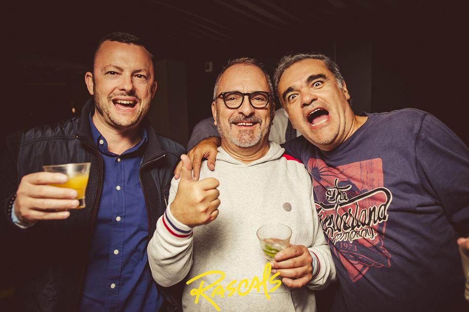 Image may contain: Portrait, Photo, Photography, Man, Apparel, Clothing, Glass, Drinking, Beer, Alcohol, Thumbs Up, Finger, Face, Accessories, Glasses, Accessory, Beverage, Drink, Person, Human