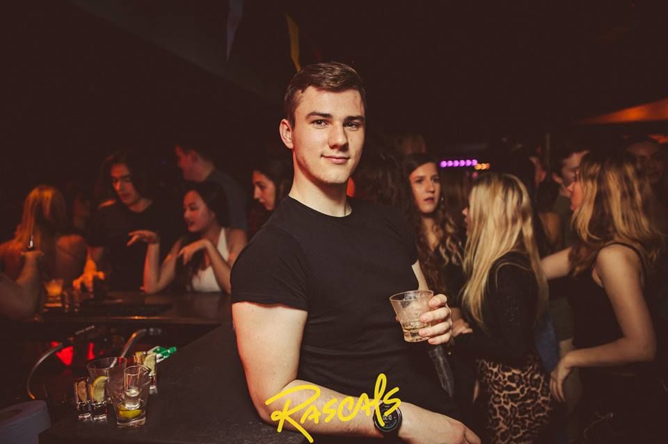 Image may contain: Pub, Bar Counter, Disco, Night Life, Party, Night Club, Club, Human, Person