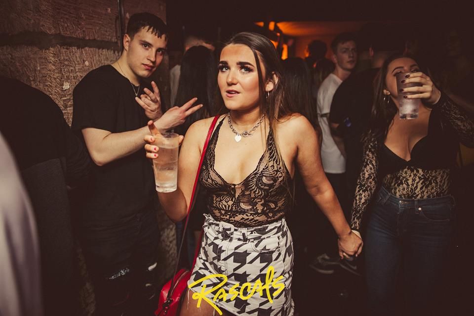 Image may contain: Pub, Bar Counter, Skin, Night Life, Party, Night Club, Club, Person, Human