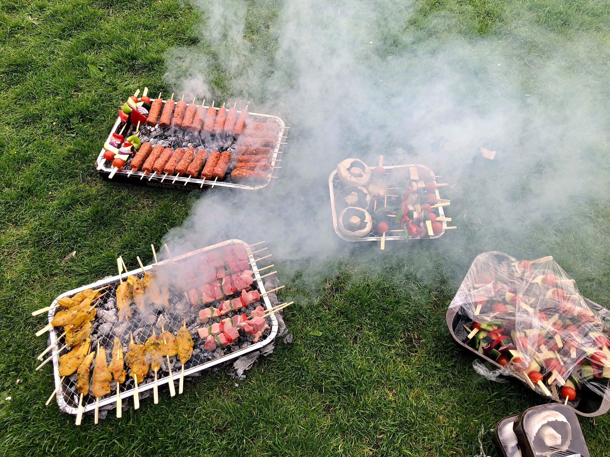Image may contain: Smoke, Bbq, Plant, Grass, Meal, Food
