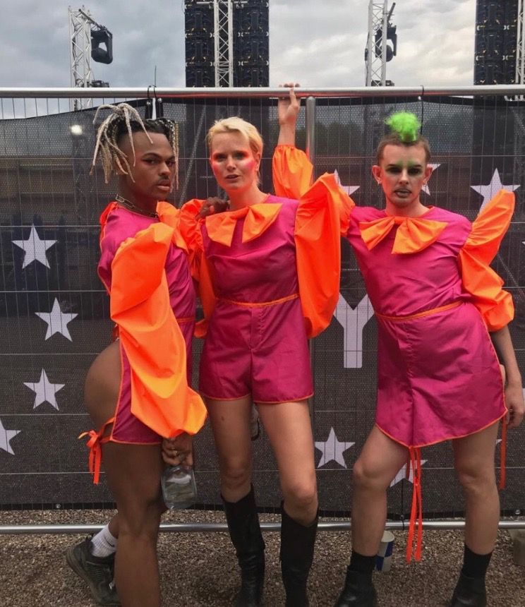 Image may contain: Crowd, Performer, Shoe, Footwear, Shorts, Costume, Apparel, Clothing, Person, Human