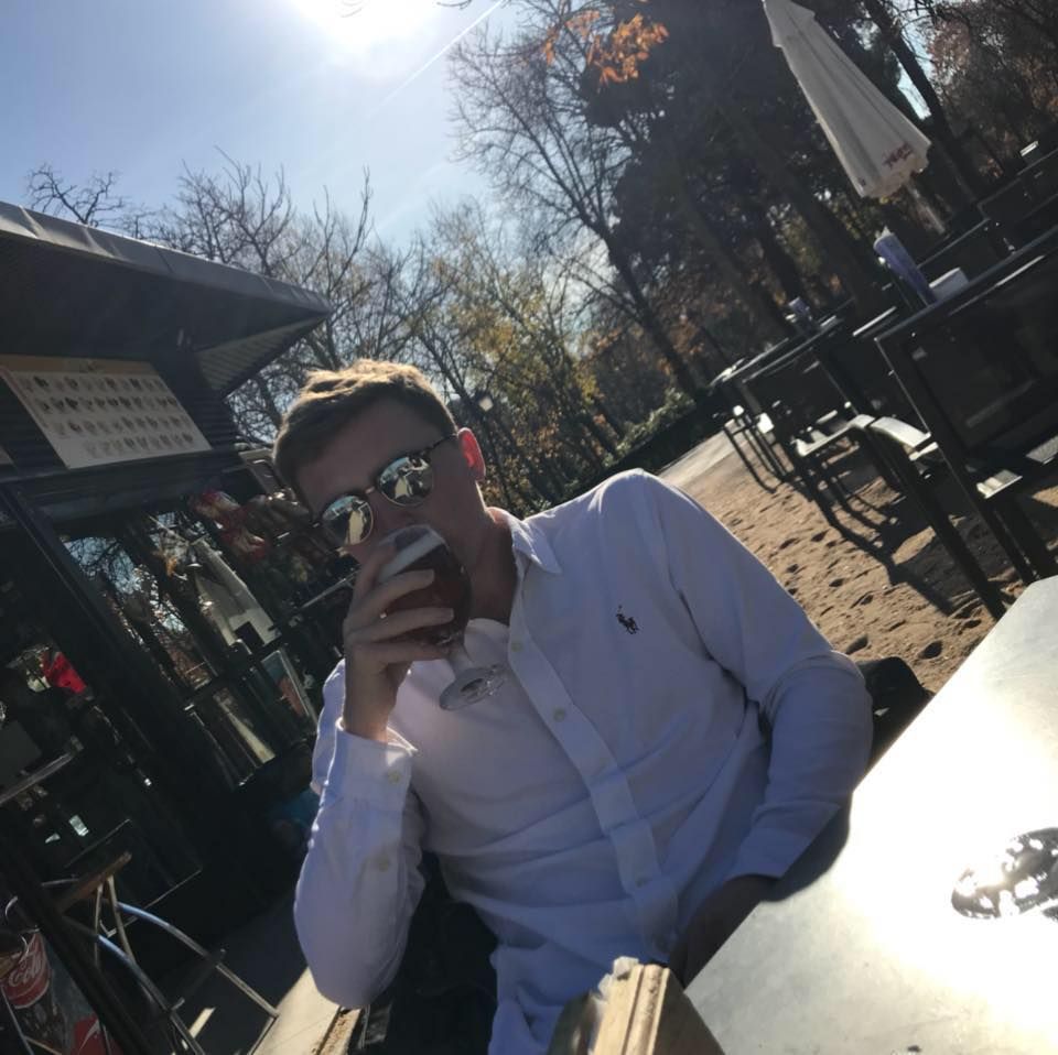 Image may contain: Face, Sunglasses, Chair, Furniture, Outdoors, Apparel, Clothing, Accessory, Accessories, Glasses, Metropolis, Building, City, Town, Urban, Person, Human
