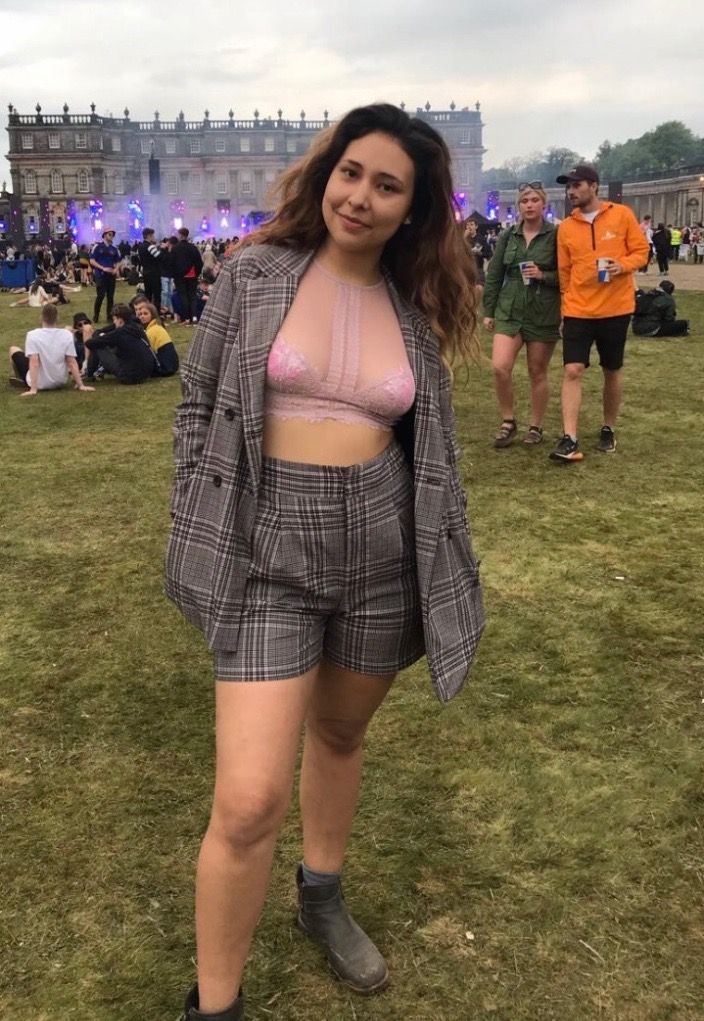 Image may contain: Girl, Tartan, Plaid, Skirt, Woman, Grass, Plant, Female, Footwear, Shoe, Shorts, Apparel, Clothing, Human, Person