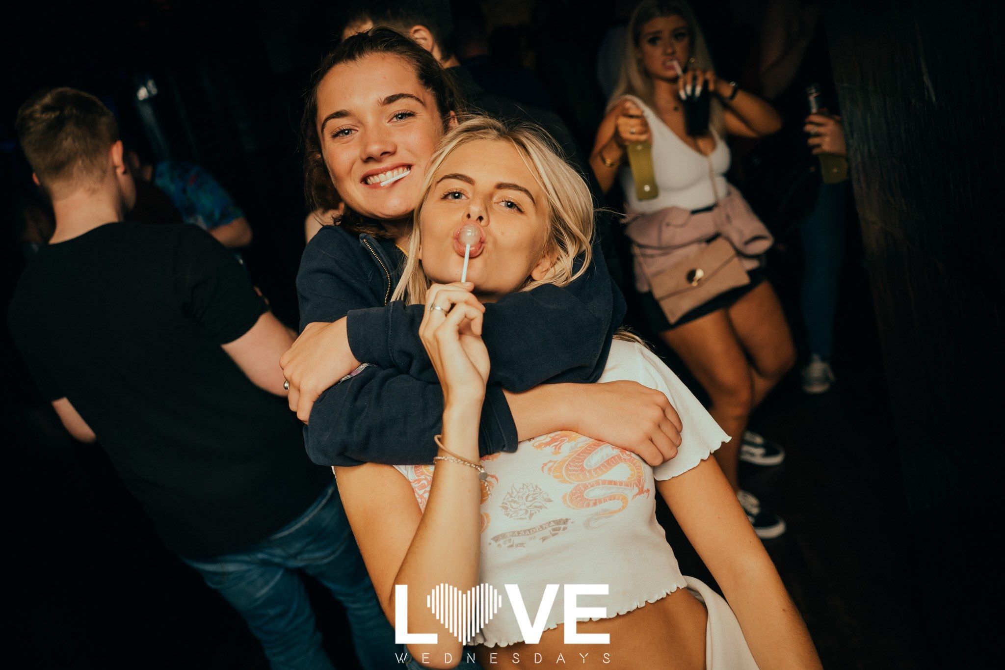 Image may contain: Finger, Night Life, Night Club, Club, Human, Person