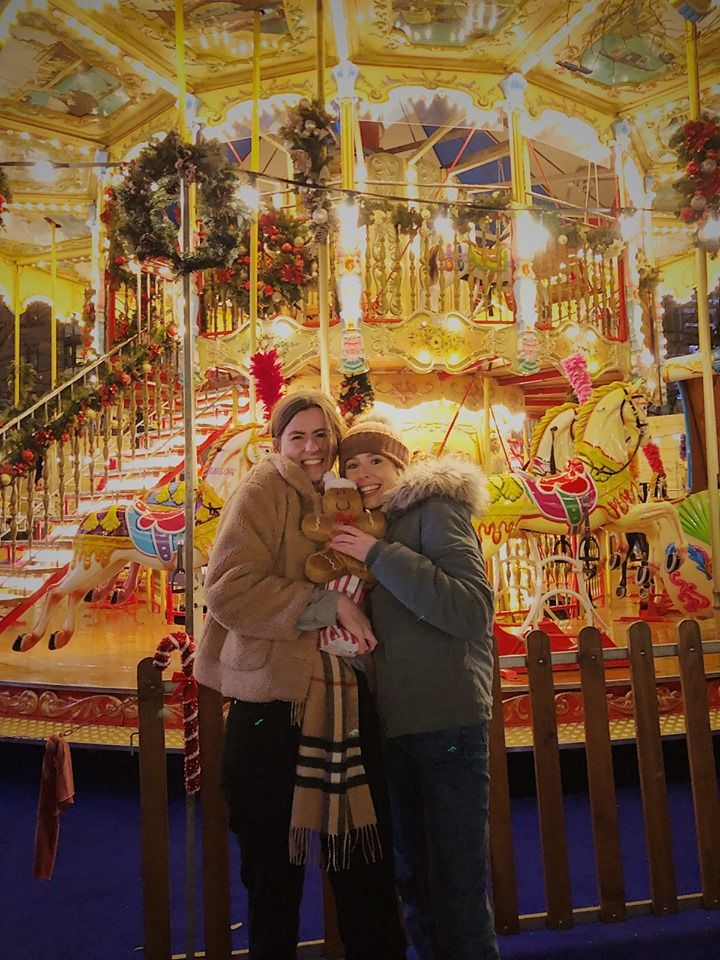 Image may contain: Girl, Carousel, Clothing, Apparel, Theme Park, Female, Amusement Park, Person, Human