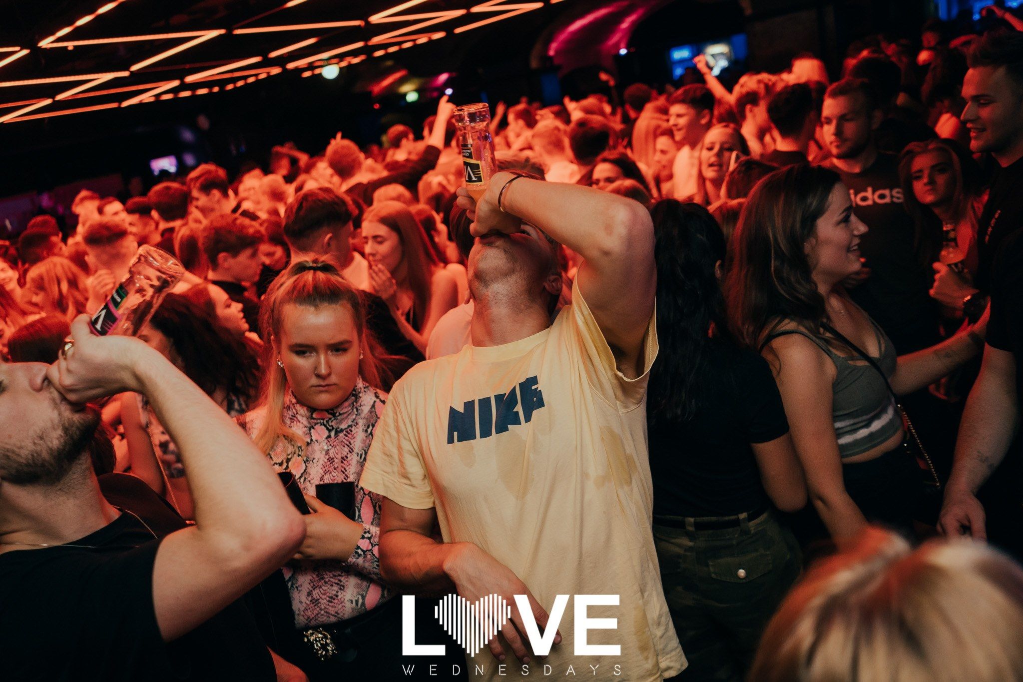 Image may contain: Night Club, Night Life, Club, Party, Human, Person, Audience, Crowd