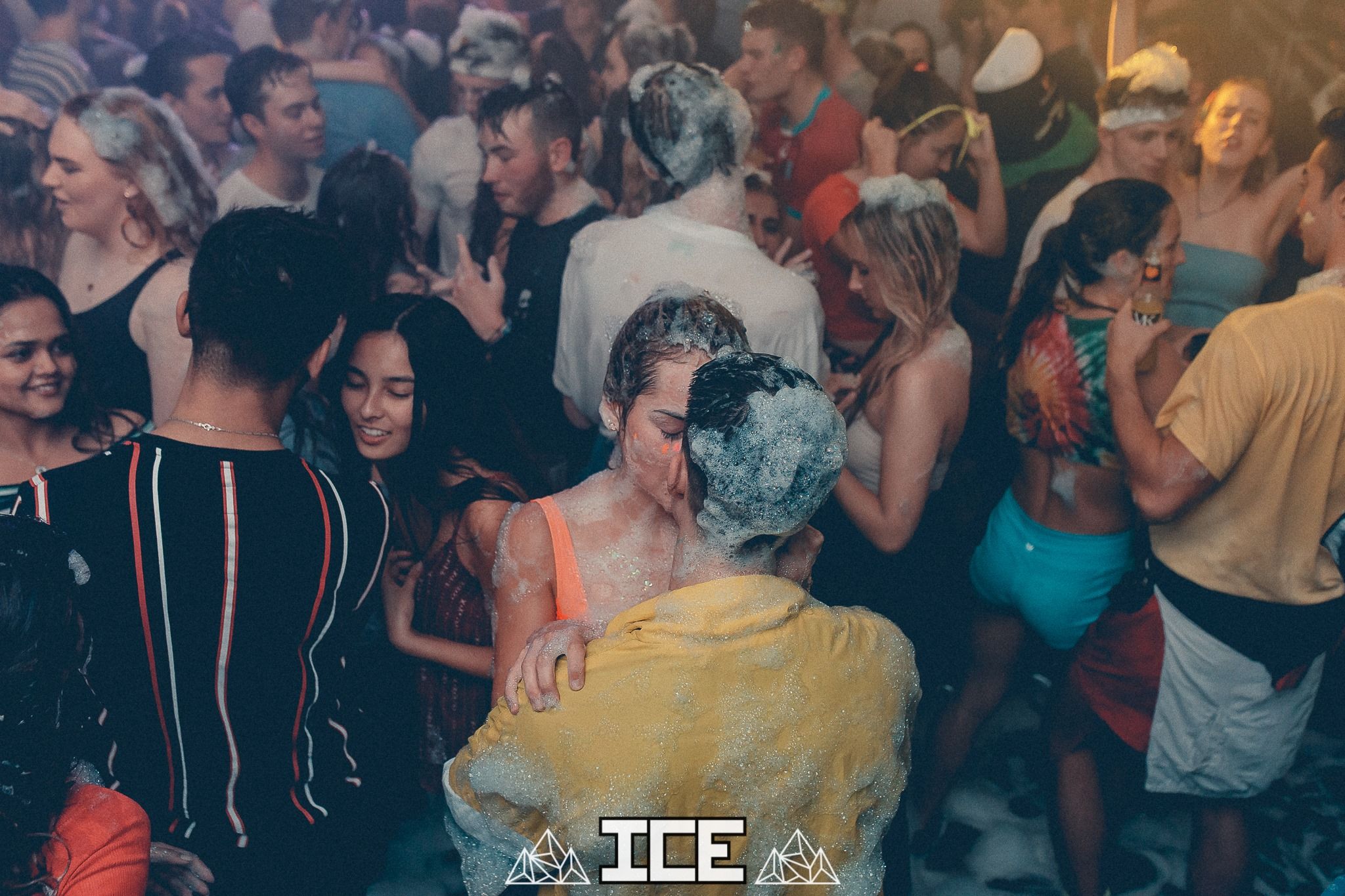 Image may contain: Night Life, Disco, Back, Crowd, Party, Night Club, Club, Person, Human, Skin