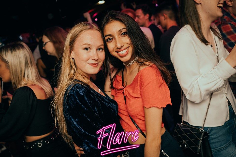 Image may contain: Night Life, Disco, Night Club, Club, Party, Person, Human