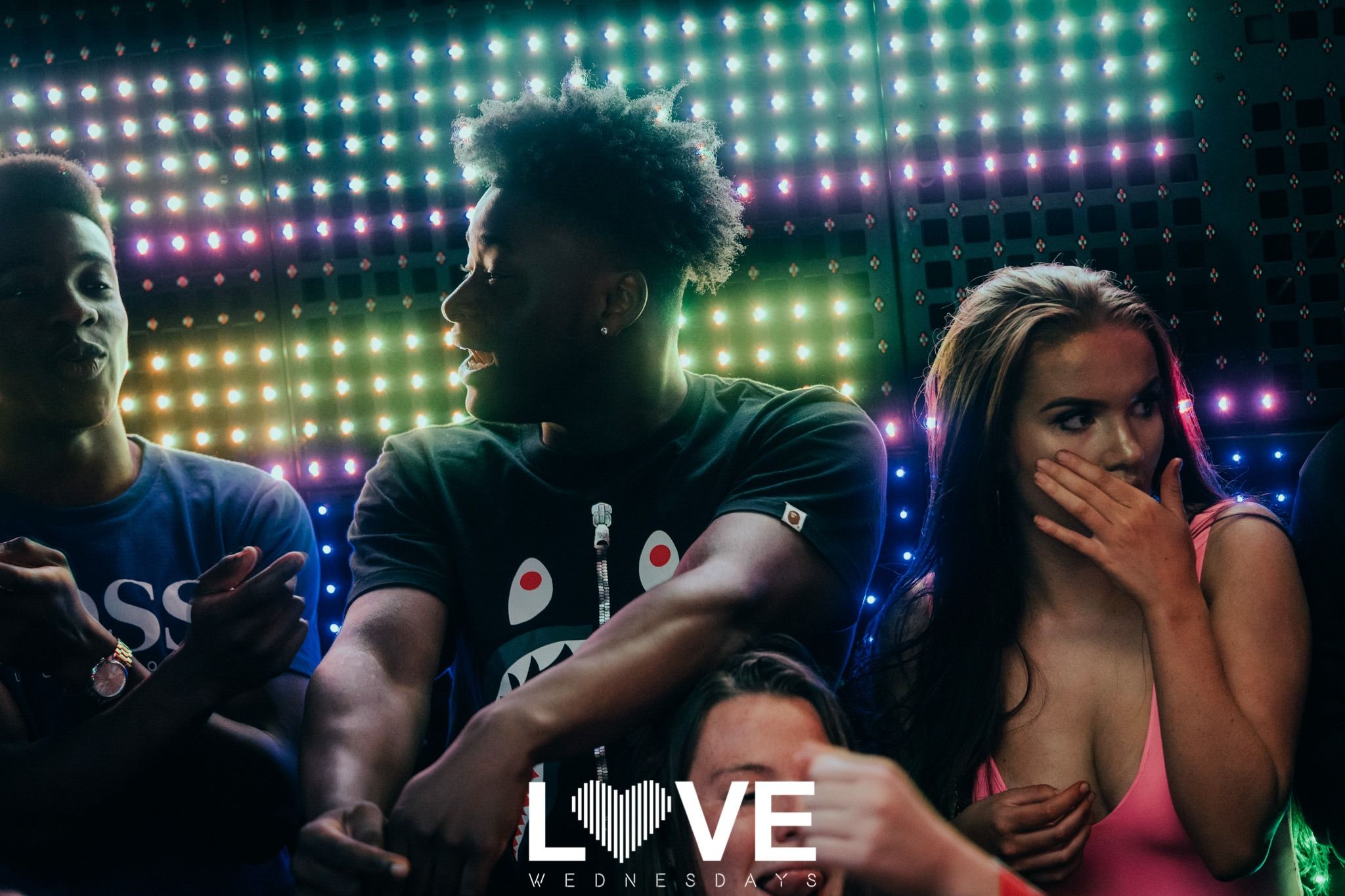 Image may contain: Night Life, Night Club, Club, Hair, Human, Person