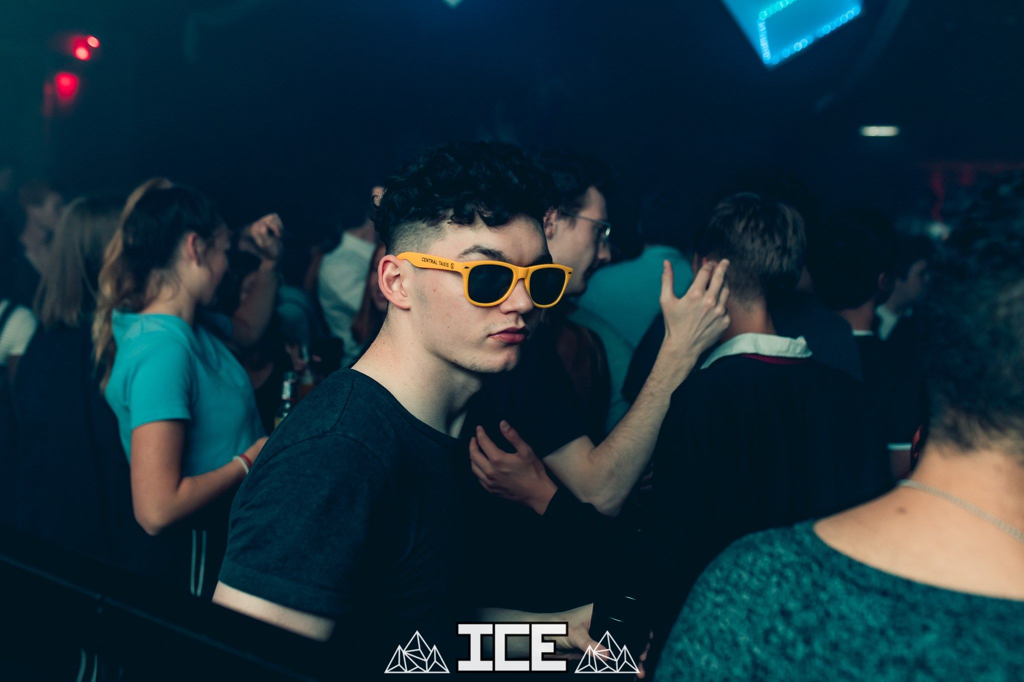 Image may contain: Party, Night Life, Night Club, Club, Accessory, Sunglasses, Accessories, Human, Person
