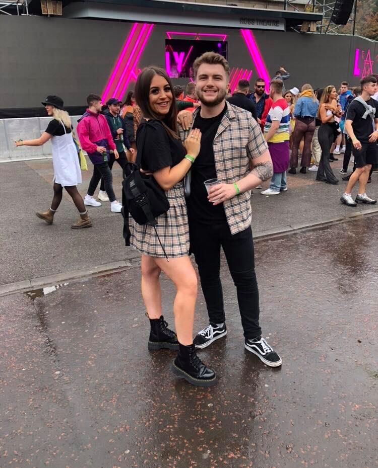 Image may contain: Pedestrian, Crowd, Pants, Costume, Face, Female, Shorts, Person, Human, Clothing, Footwear, Apparel, Shoe
