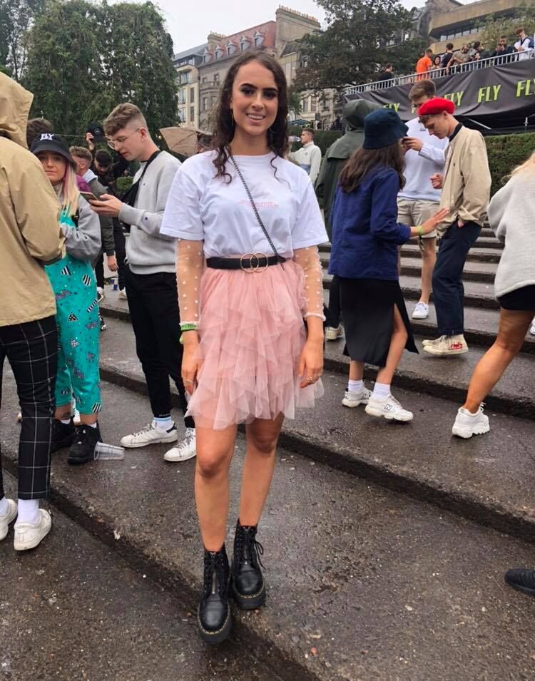 Image may contain: Woman, Skirt, Female, Shorts, Human, Person, Shoe, Apparel, Clothing, Footwear
