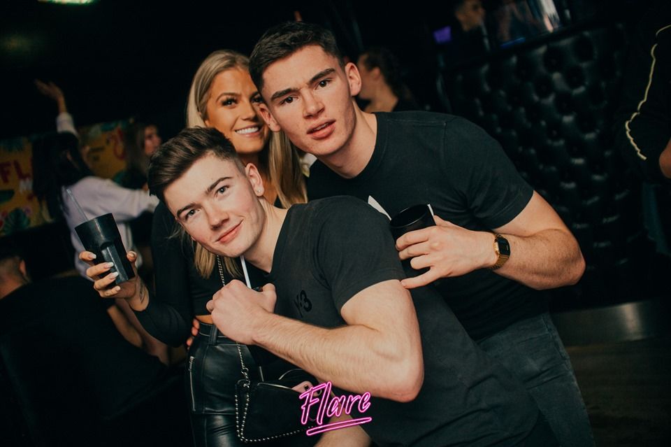 Image may contain: Bar Counter, Audience, Crowd, Pub, Party, Night Life, Night Club, Club, Person, Human