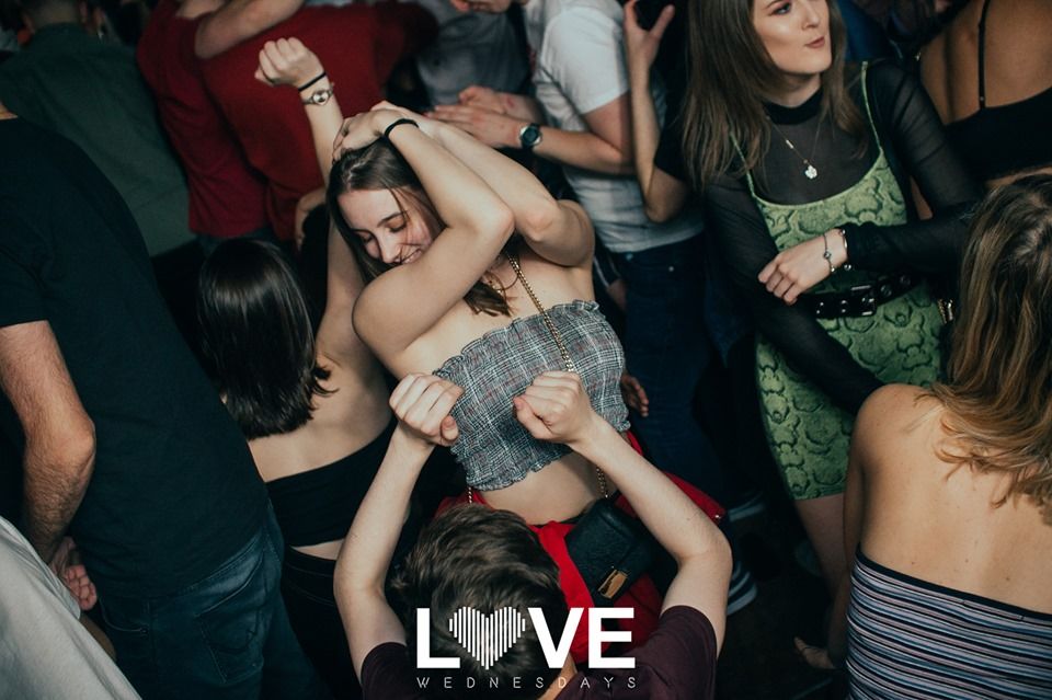 Image may contain: Bar Counter, Pub, Skin, Night Life, Night Club, Club, Party, Person, Human