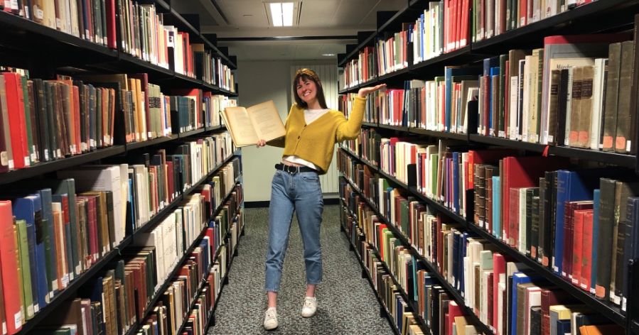 Image may contain: Chair, Shelf, Home Decor, Furniture, Clothing, Footwear, Apparel, Shoe, Library, Book, Indoors, Room, Person, Human