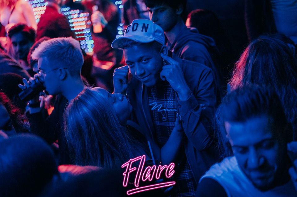 Image may contain: Crowd, Disco, Party, Night Life, Night Club, Apparel, Clothing, Hat, Club, Human, Person