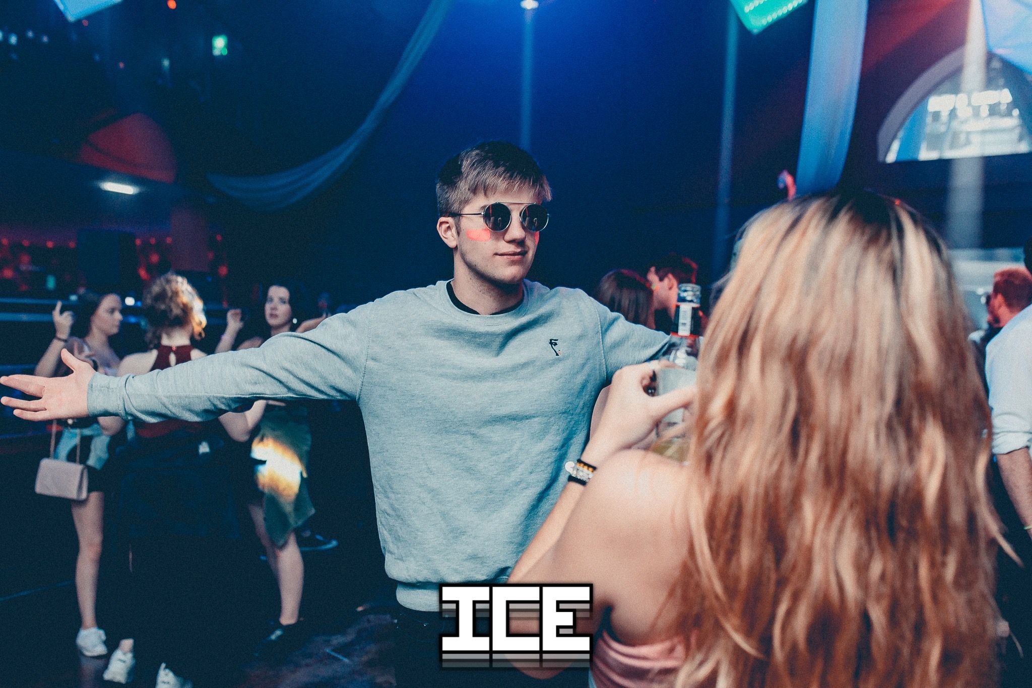 Image may contain: Crowd, Night Life, Night Club, Club, Accessory, Sunglasses, Accessories, Person, Human