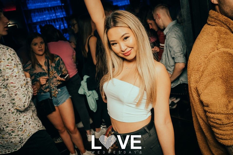 Image may contain: Disco, Party, Night Club, Club, Human, Person