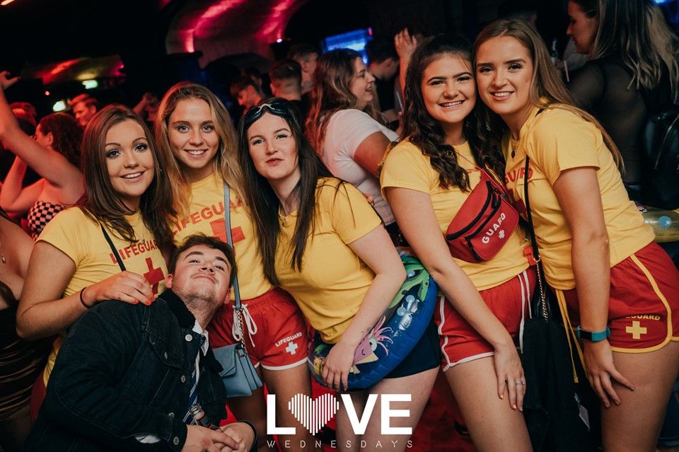 Image may contain: Face, Night Club, Club, Party, Human, Person