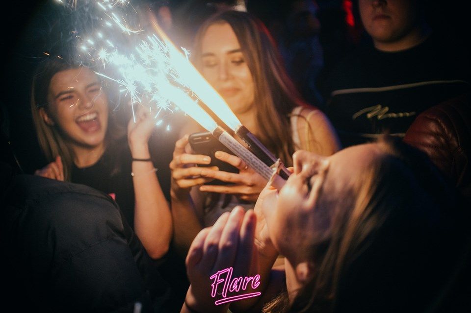 Image may contain: Finger, Face, Night Club, Party, Club, Human, Person, Night Life