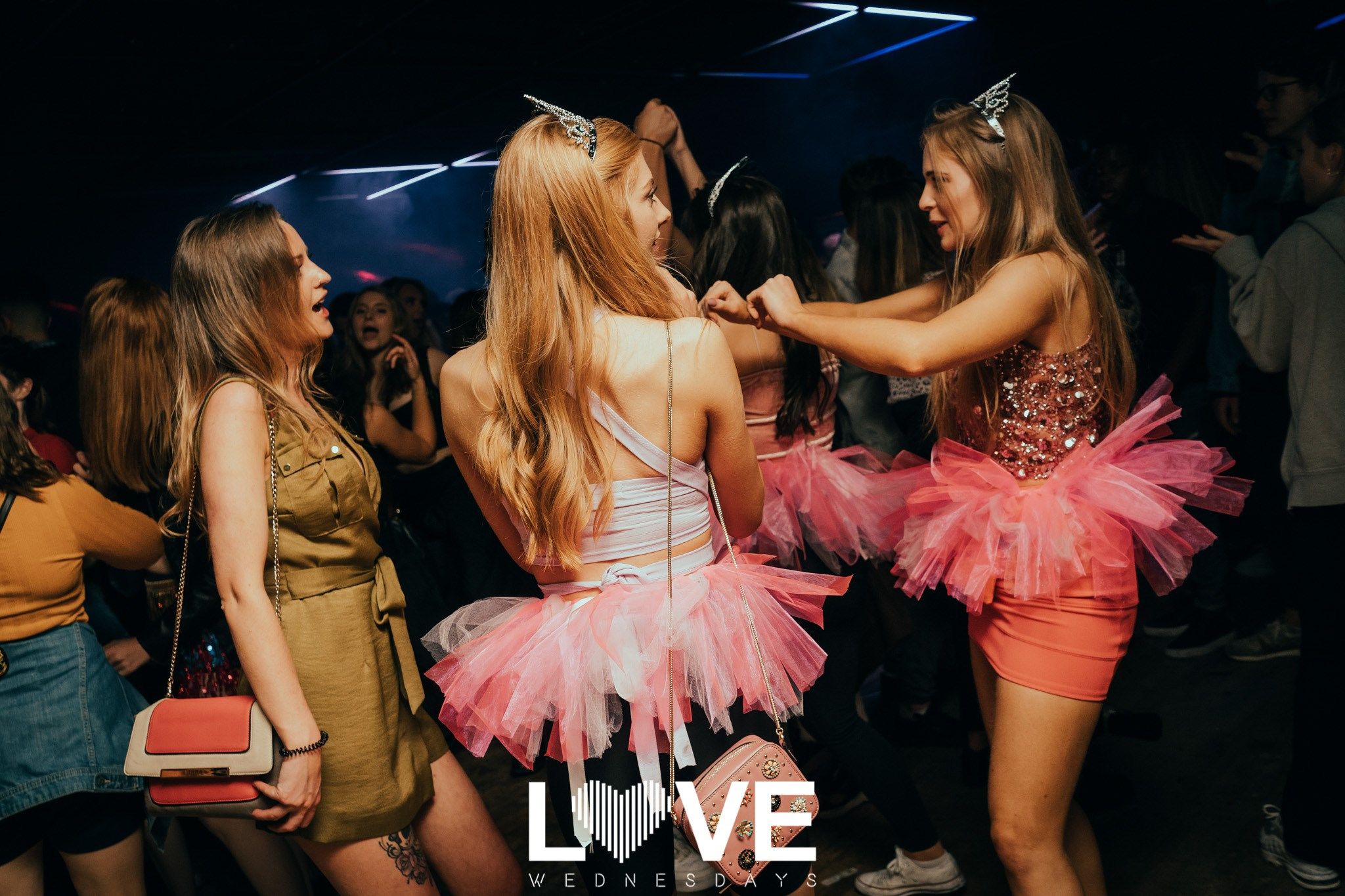 Image may contain: Gown, Evening Dress, Fashion, Robe, Night Life, Night Club, Club, Shoe, Clothing, Footwear, Apparel, Dance Pose, Leisure Activities, Person, Human
