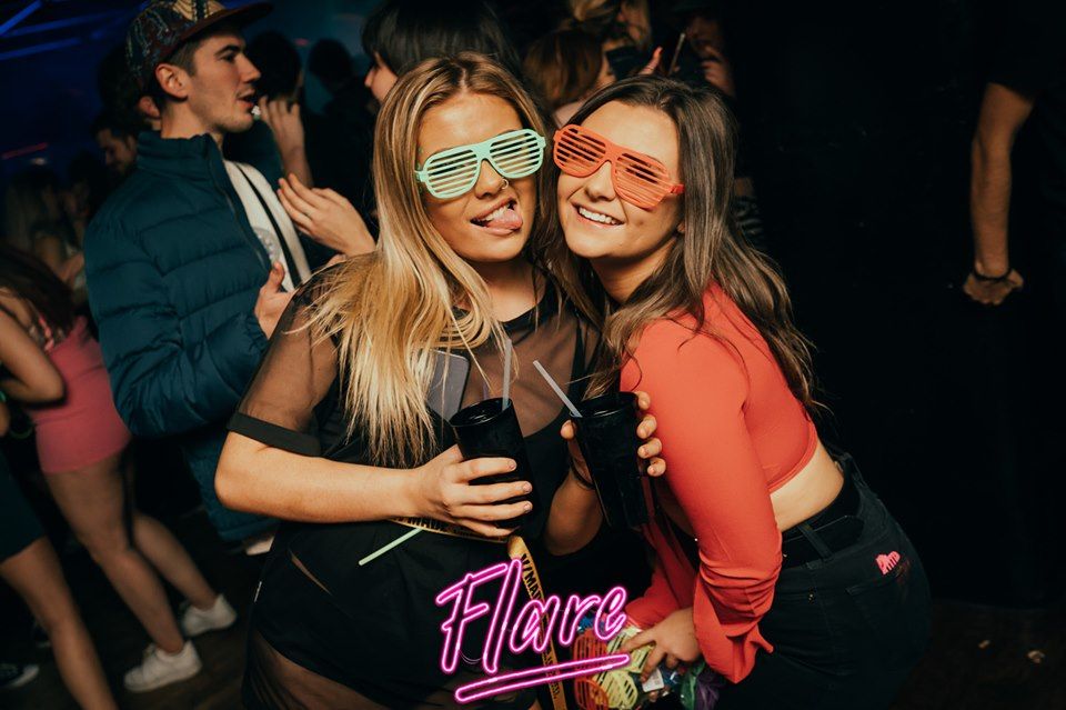 Image may contain: Leisure Activities, Night Life, Night Club, Club, Party, Accessory, Accessories, Sunglasses, Human, Person