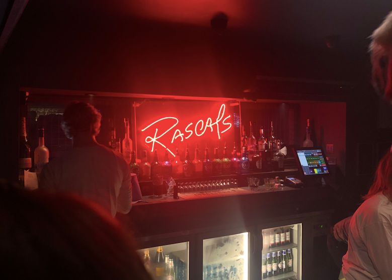 Image may contain: Light, Bar Counter, Pub, Night Life, Night Club, Club, Human, Person